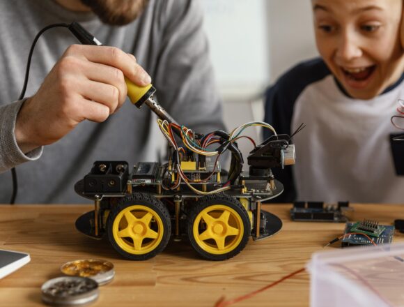 father-son-making-robot Nearly 80 Schools Will Receive Grants For Robotics