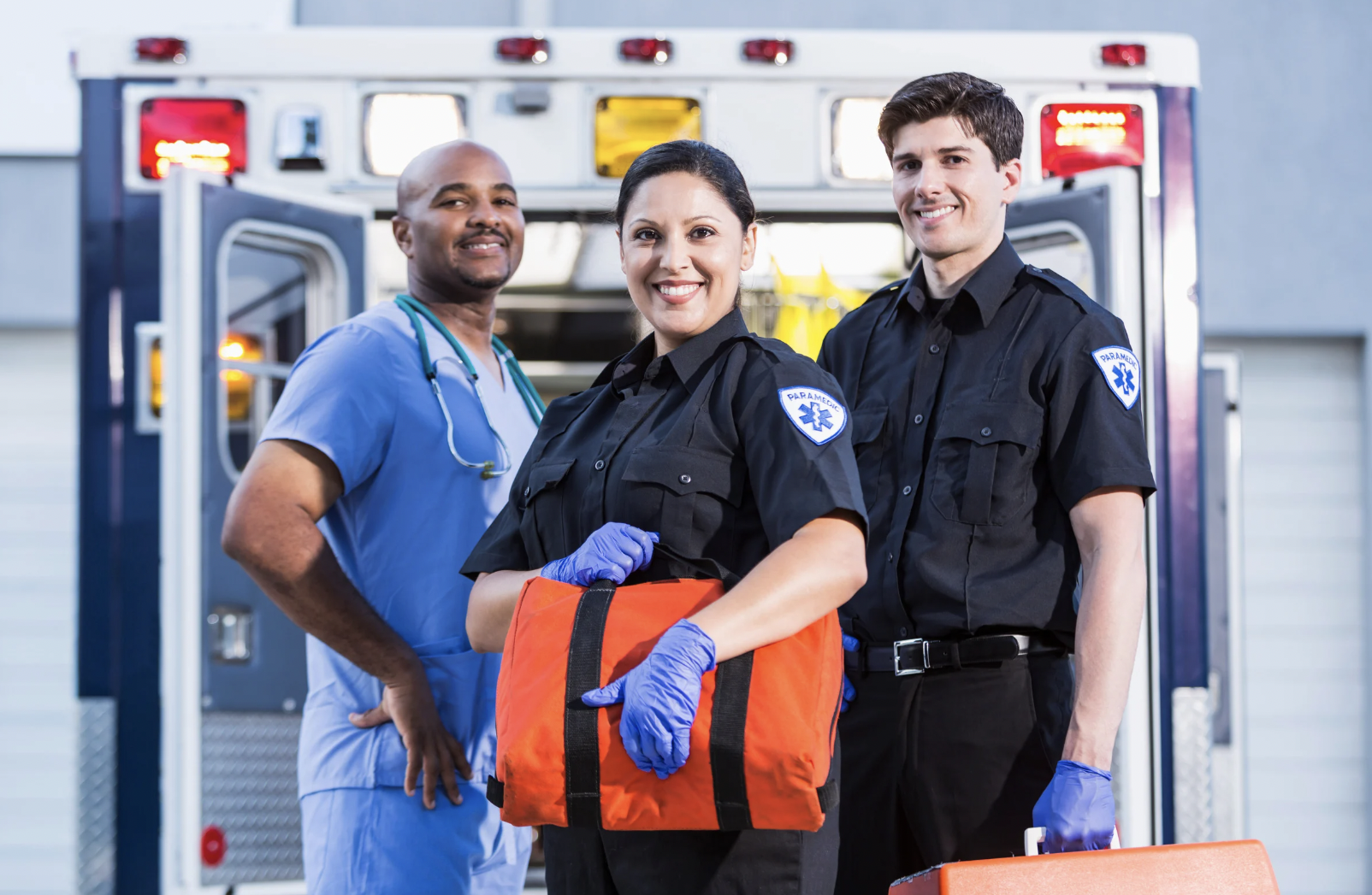 team of first responders providing emergency care